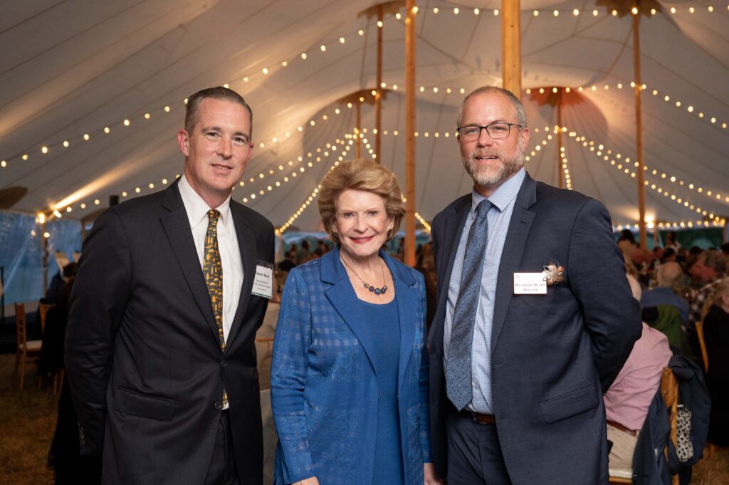 Craven Rand, Senator Debbie Stabenow, and Dr. Richard T. Olsen at Dinner Under the Stars