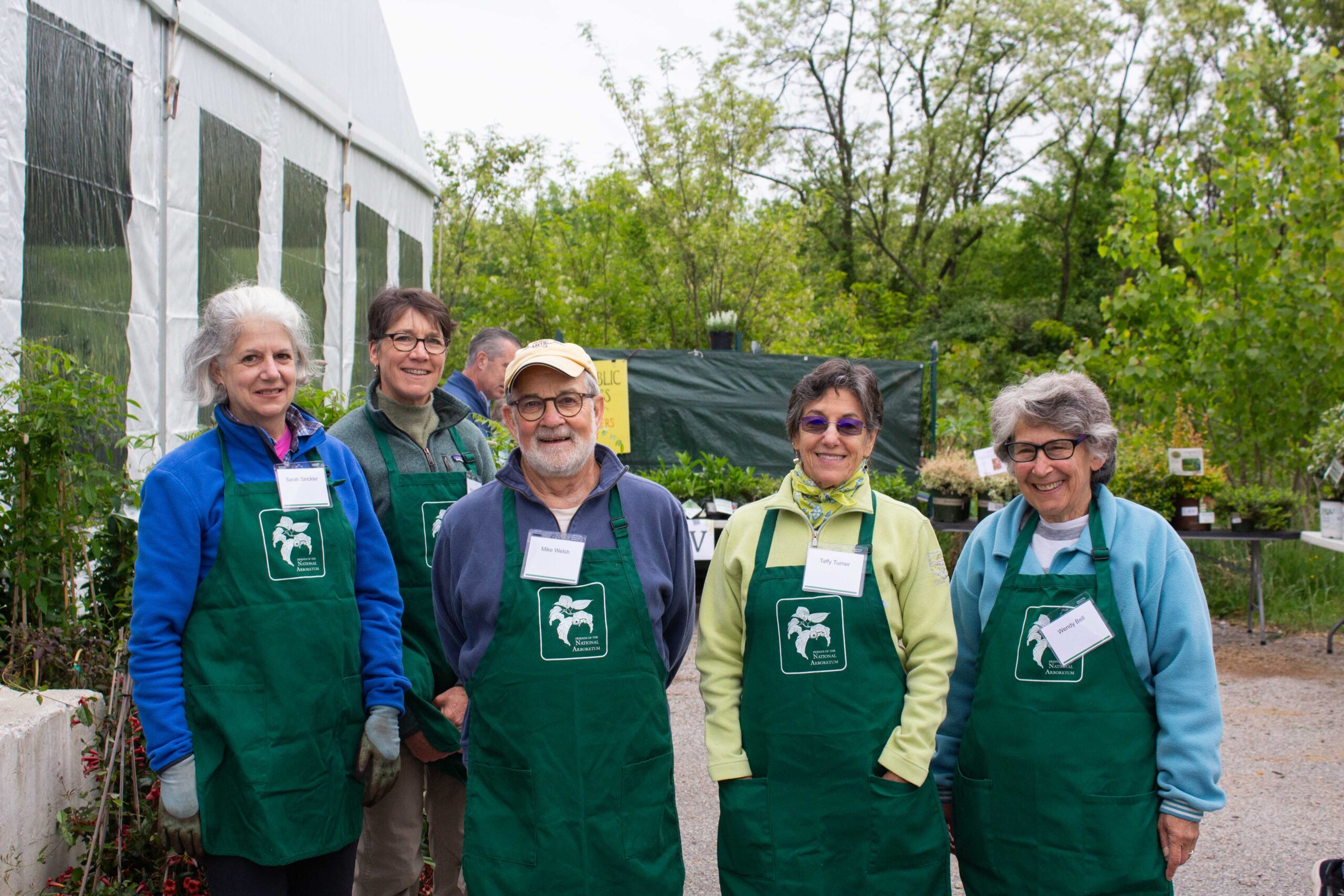 garden fair volunteers get ready for the event