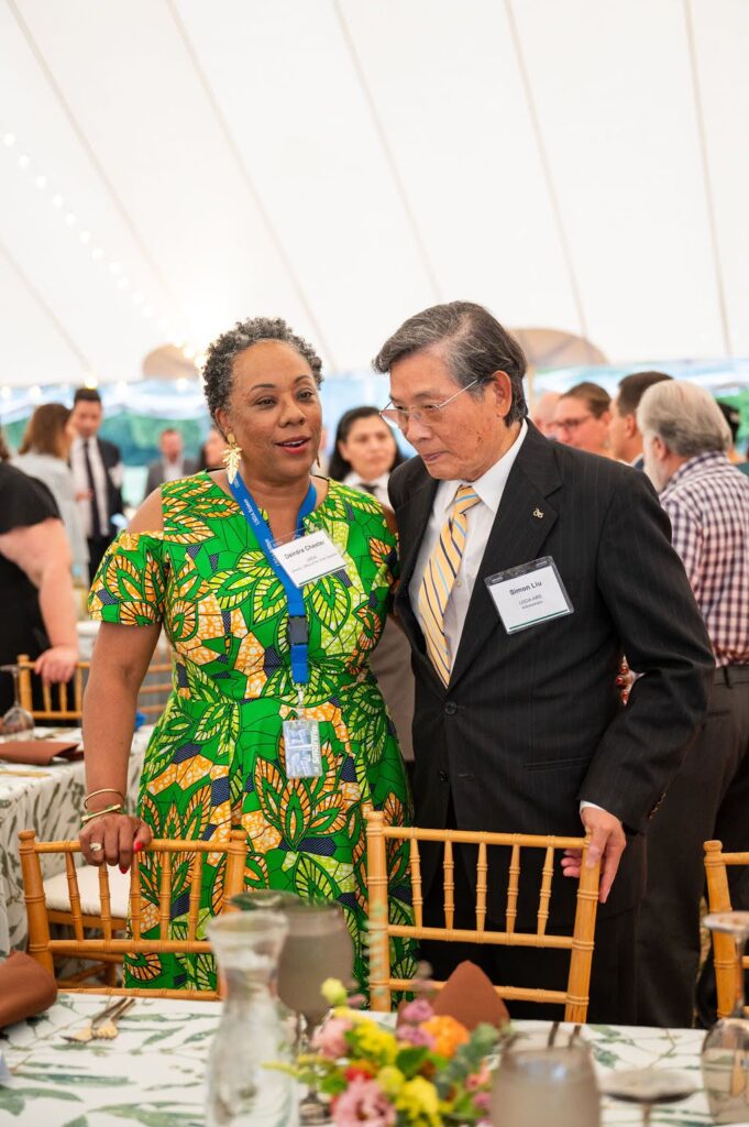 Dr. Dierdra Chester, Director of the USDA Office of the Chief Scientist, talking with Dr. Simon Liu, Administrator of the USDA Agricultural Research Service.